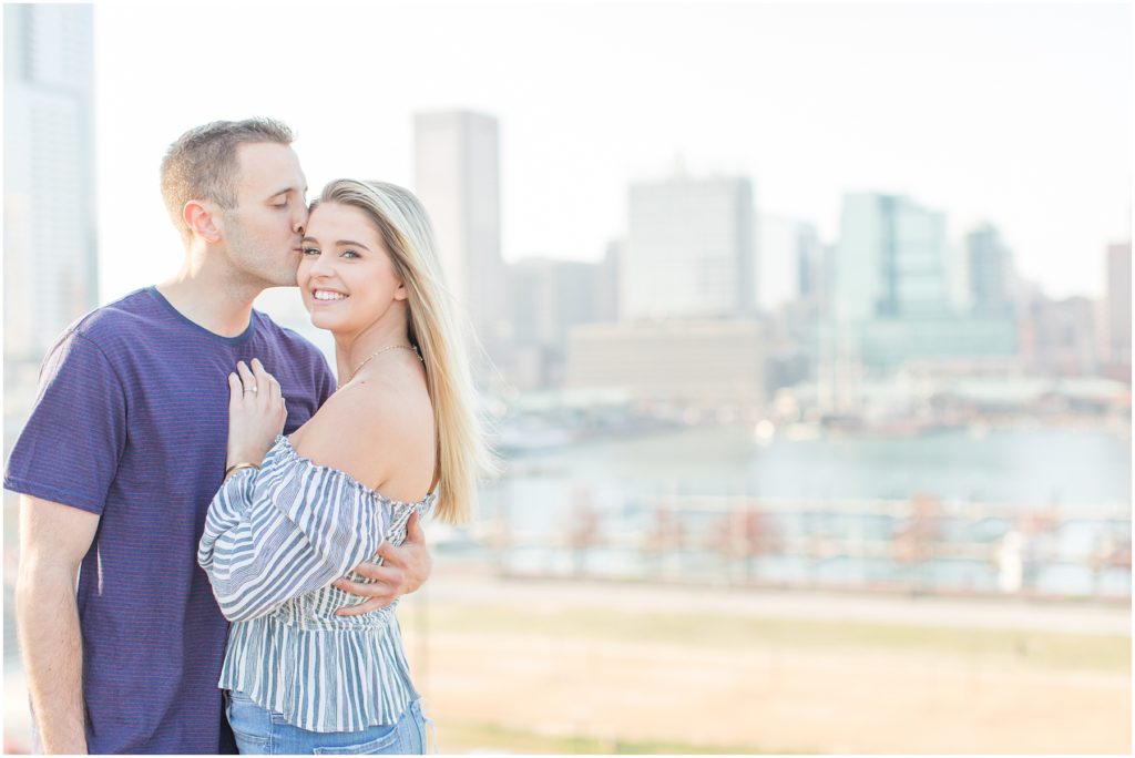 Federal Hill Baltimore Engagement Session with off the shoulder shirt and jeans