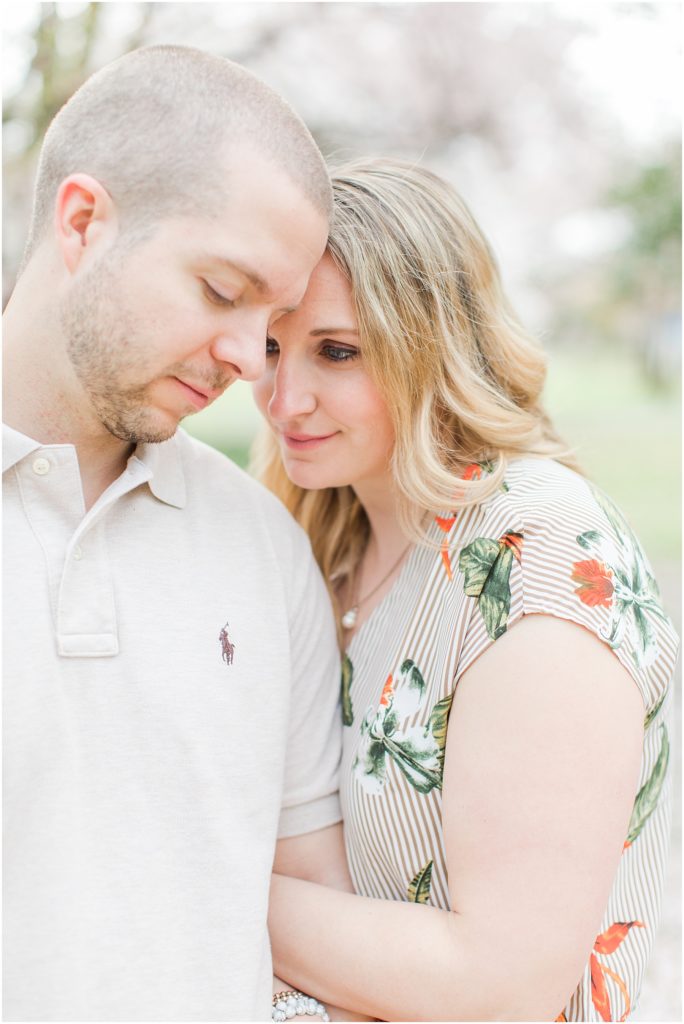 Washington DC Cherry Blossom Engagement Session with floral top and jeans