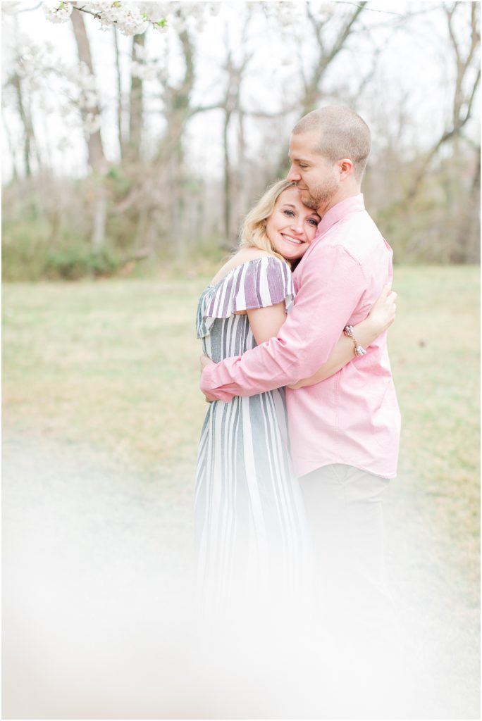 Washington DC Cherry Blossom Engagement Session with long striped dress