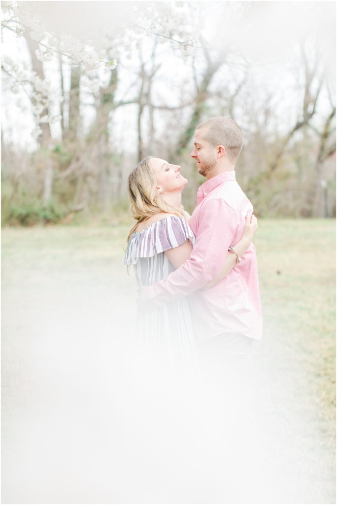 Washington DC Cherry Blossom Engagement Session with long striped dress